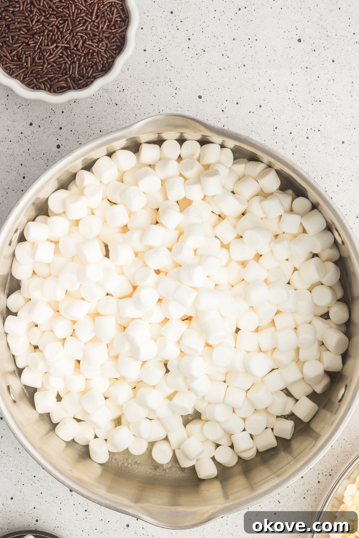 Monster Mash Krispies 4 Marshmallows added to a large pot with melted butter.