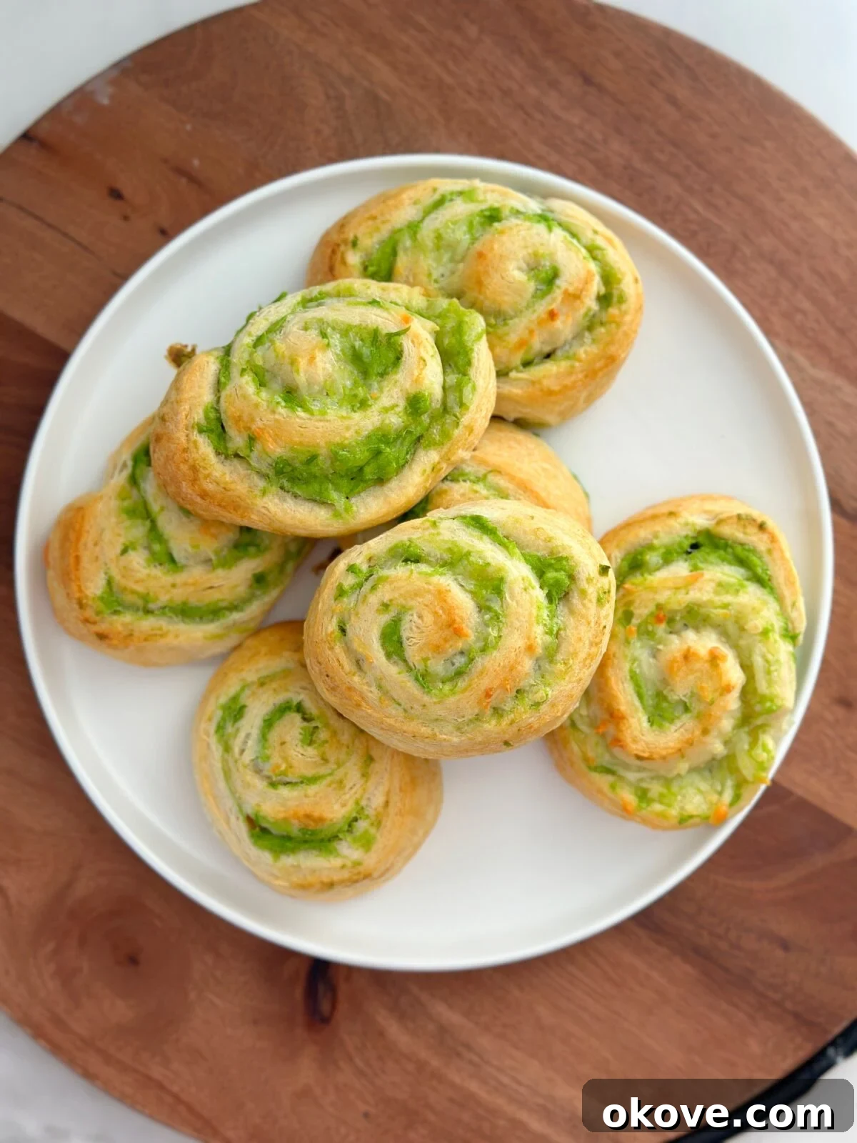 Pea and cream cheese pinwheels on a plate