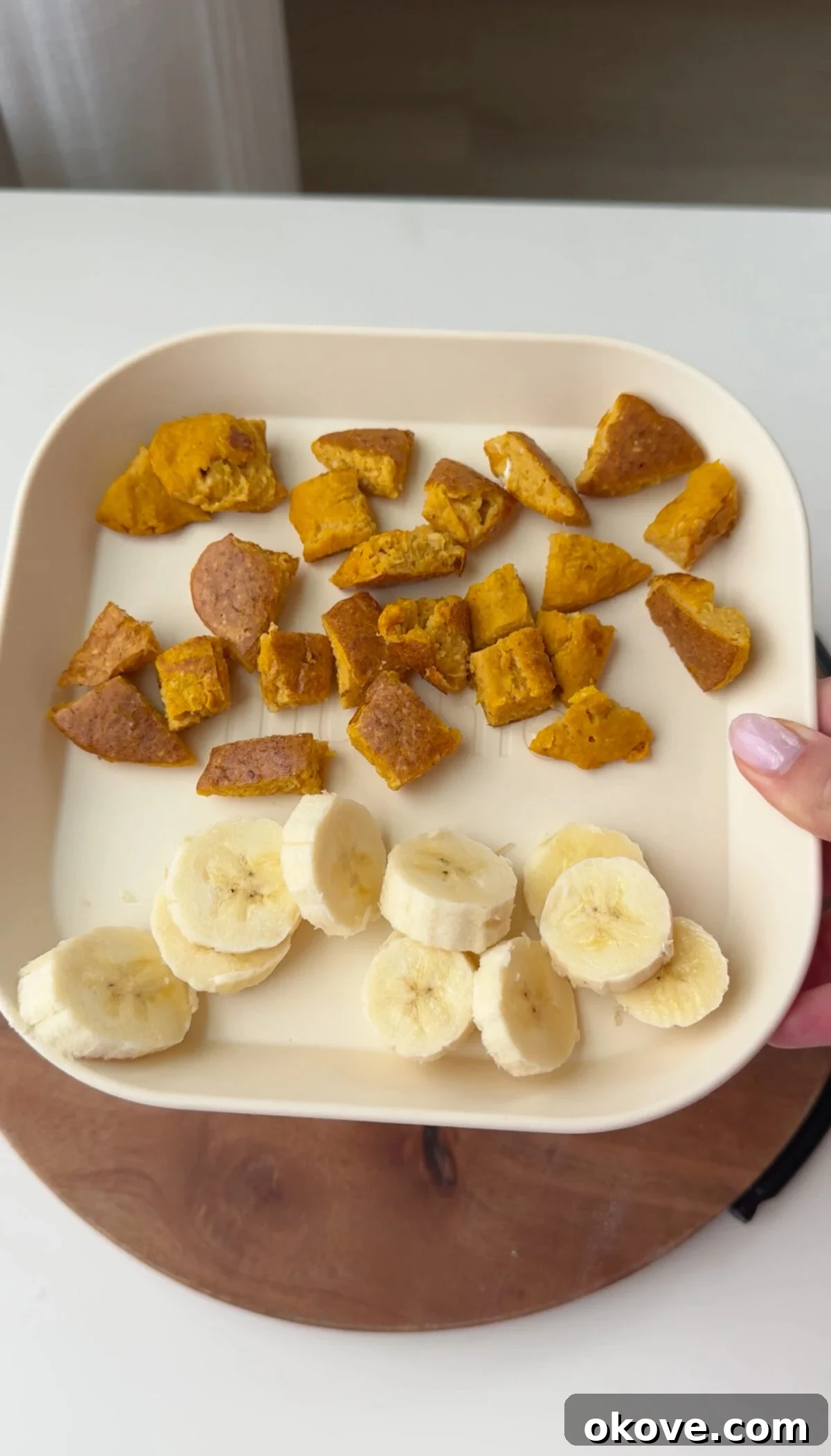 Autumn's Bounty for Little Ones: Pumpkin, Apple, Sweet Potato Recipes 5 healthy blw pumpkin pancakes on a plate with banana slices