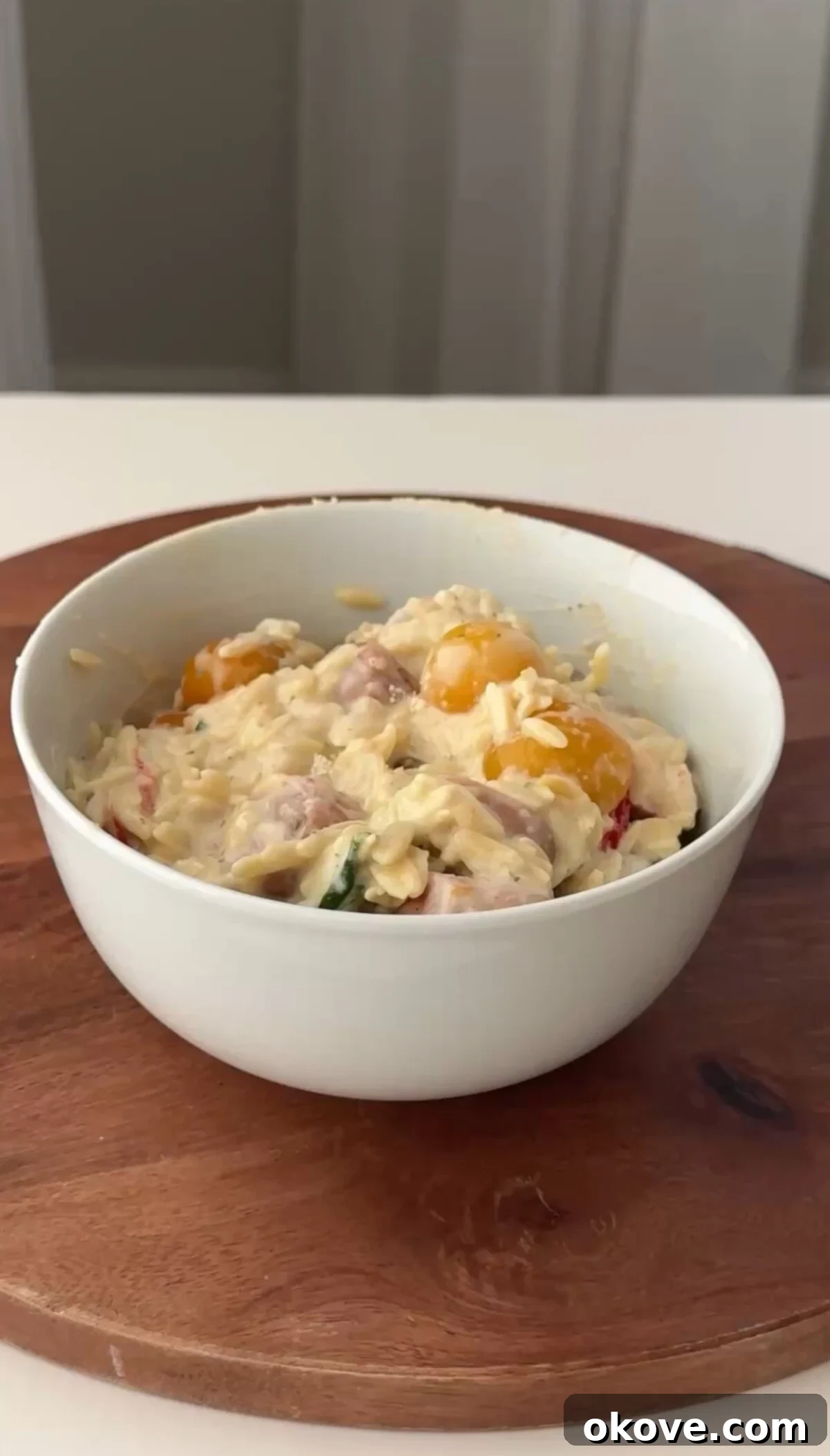 Hearty Sausage Orzo Gratin 2 Cheesy Sausage Orzo Bake in a baking dish