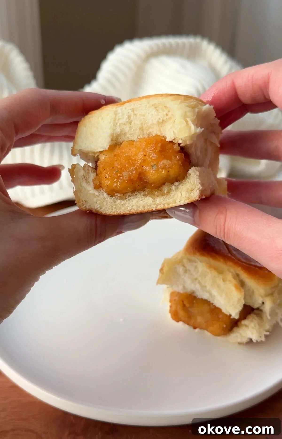 Delectable Honey Ranch Chicken Sliders 2 Honey Ranch Chicken Sliders served on a plate