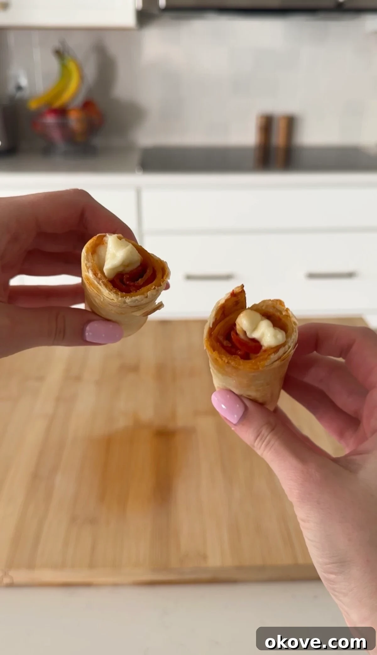 Cheesy Pizza Dippers 2 Crispy golden pizza sticks made with tortillas, mozzarella, and pepperoni, perfect for dipping, arranged on a plate.