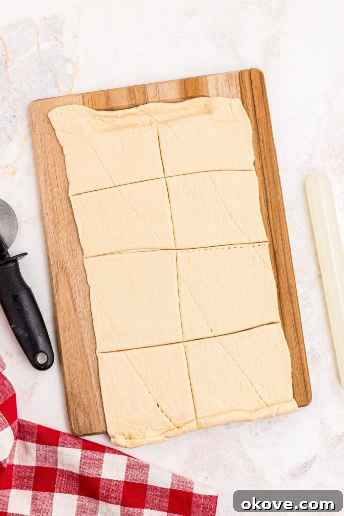 Muffin Tin Pizzas 4 Crescent roll dough rolled out and cut into eight sections.