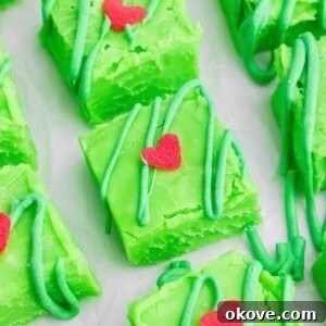 Bright green squares of fudge cut on a white table. Ready to be served.