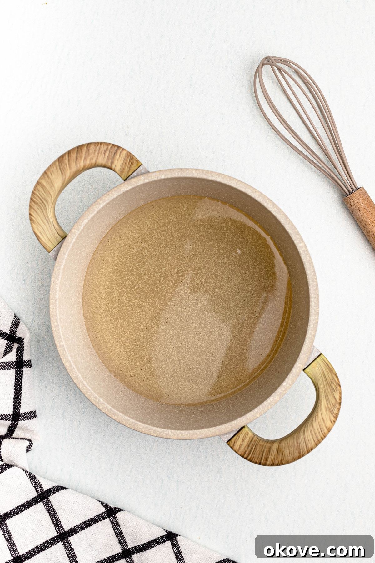 Effortless Simple Syrup for Perfect Drinks 5 Sugar and water in a saucepan, heated together until the sugar dissolves, making simple syrup.