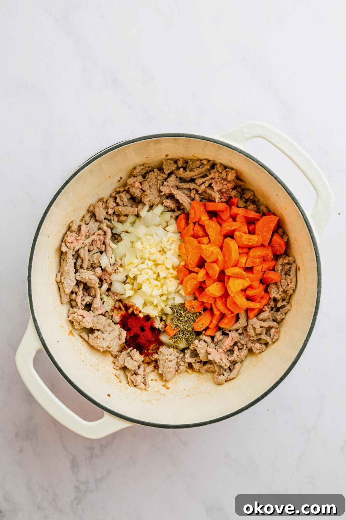 Stuffed Cabbage Soup 4 Ground turkey and veggies in a stock pot before adding other ingredients to make cabbage roll soup. Building the flavor base.