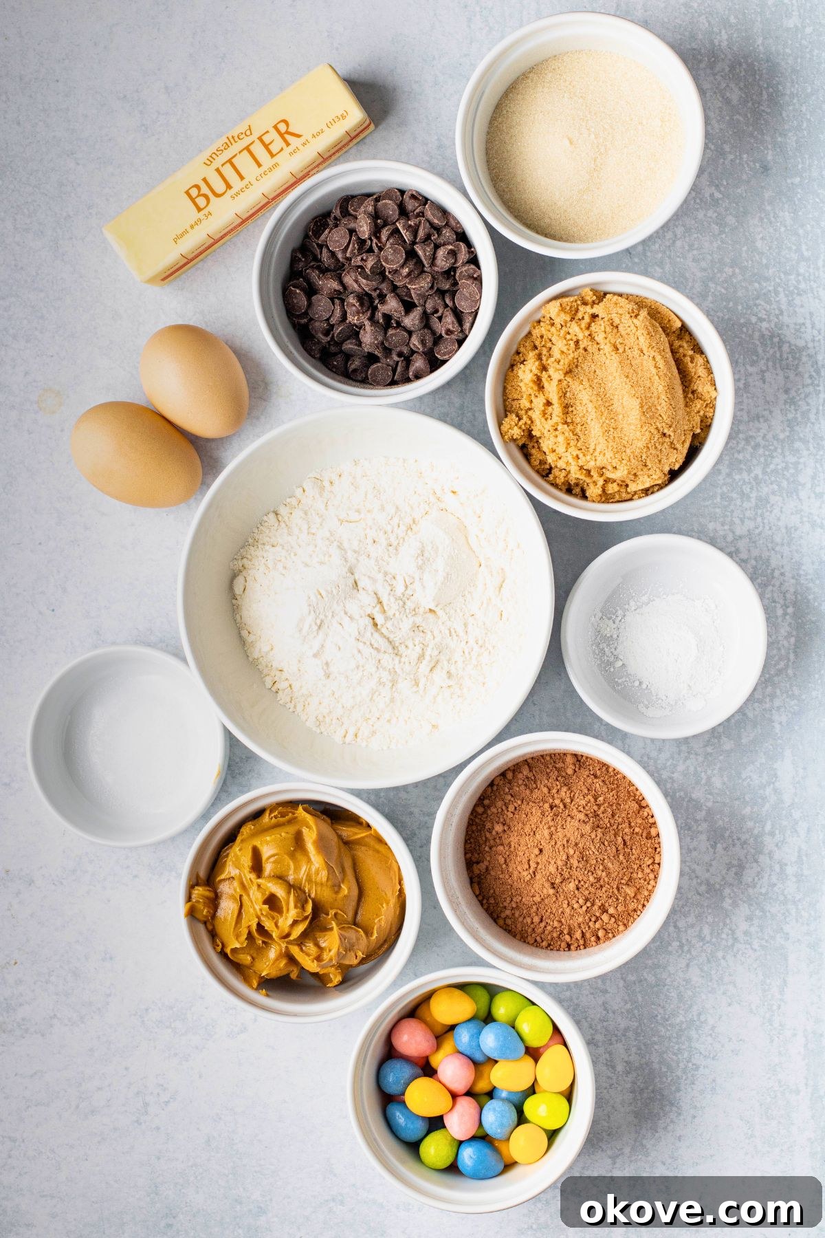 Ingredients needed to make Easter brownies measured into small white bowls.