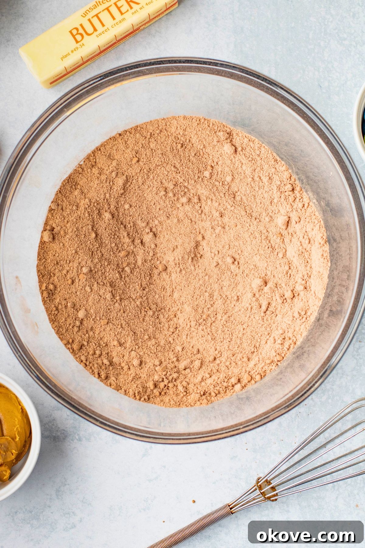 Dry Ingredients being mixed into large mixing bowl.