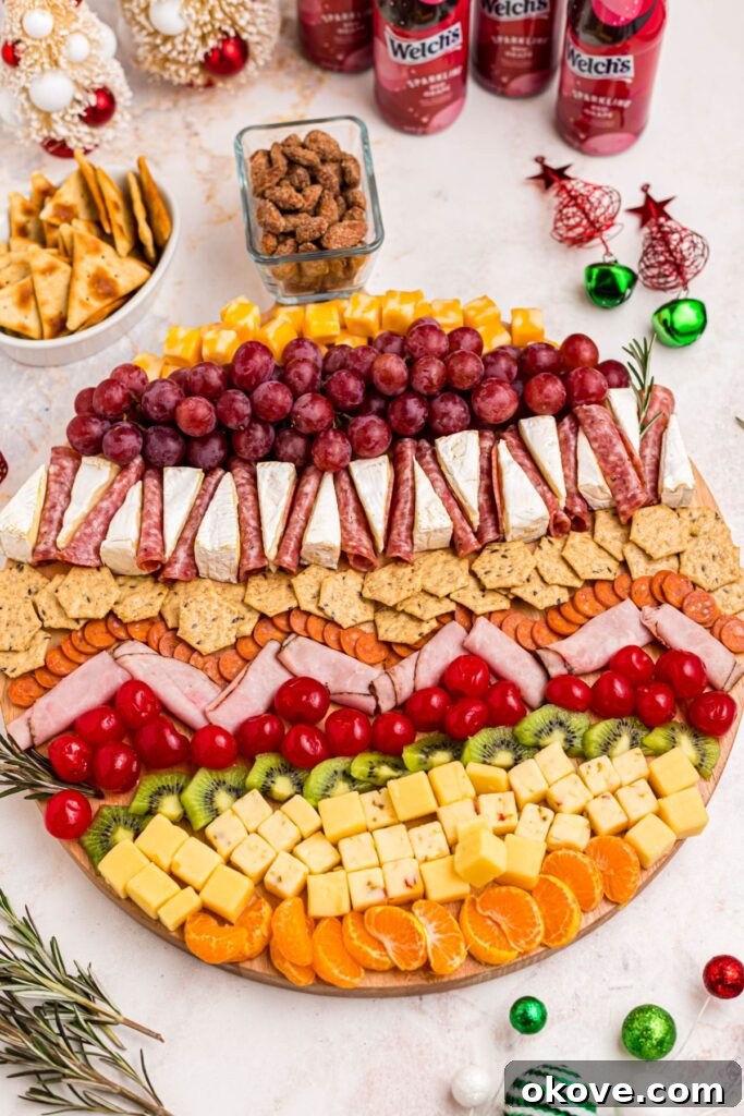 A festive Christmas charcuterie board laden with meats, cheeses, and fruits, creating a stunning visual display.