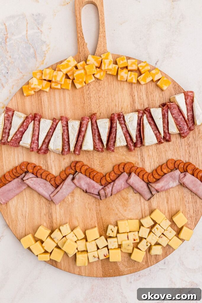 A close-up view of a charcuterie board featuring an array of beautifully arranged meats and cheeses.
