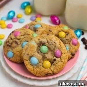 Golden baked chocolate chip cookies with Easter m and m;s.
