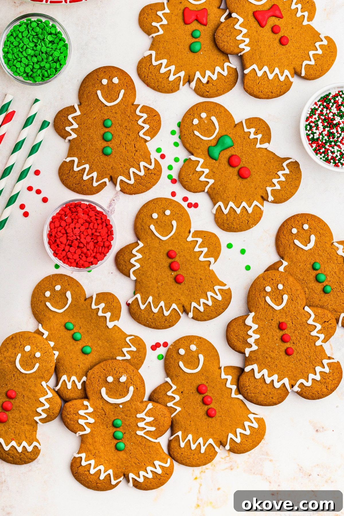 Festive Gingerbread Delights 10 Golden gingerbread cookies in the shape of gingerbread men, decorated with red, white, and green icing.