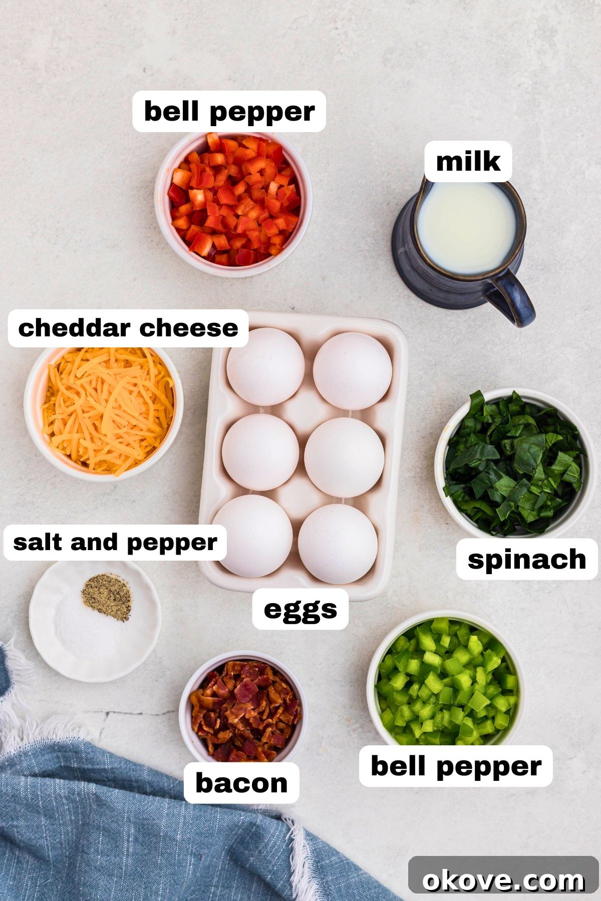 Ingredients measured into small bowls on a marble table.