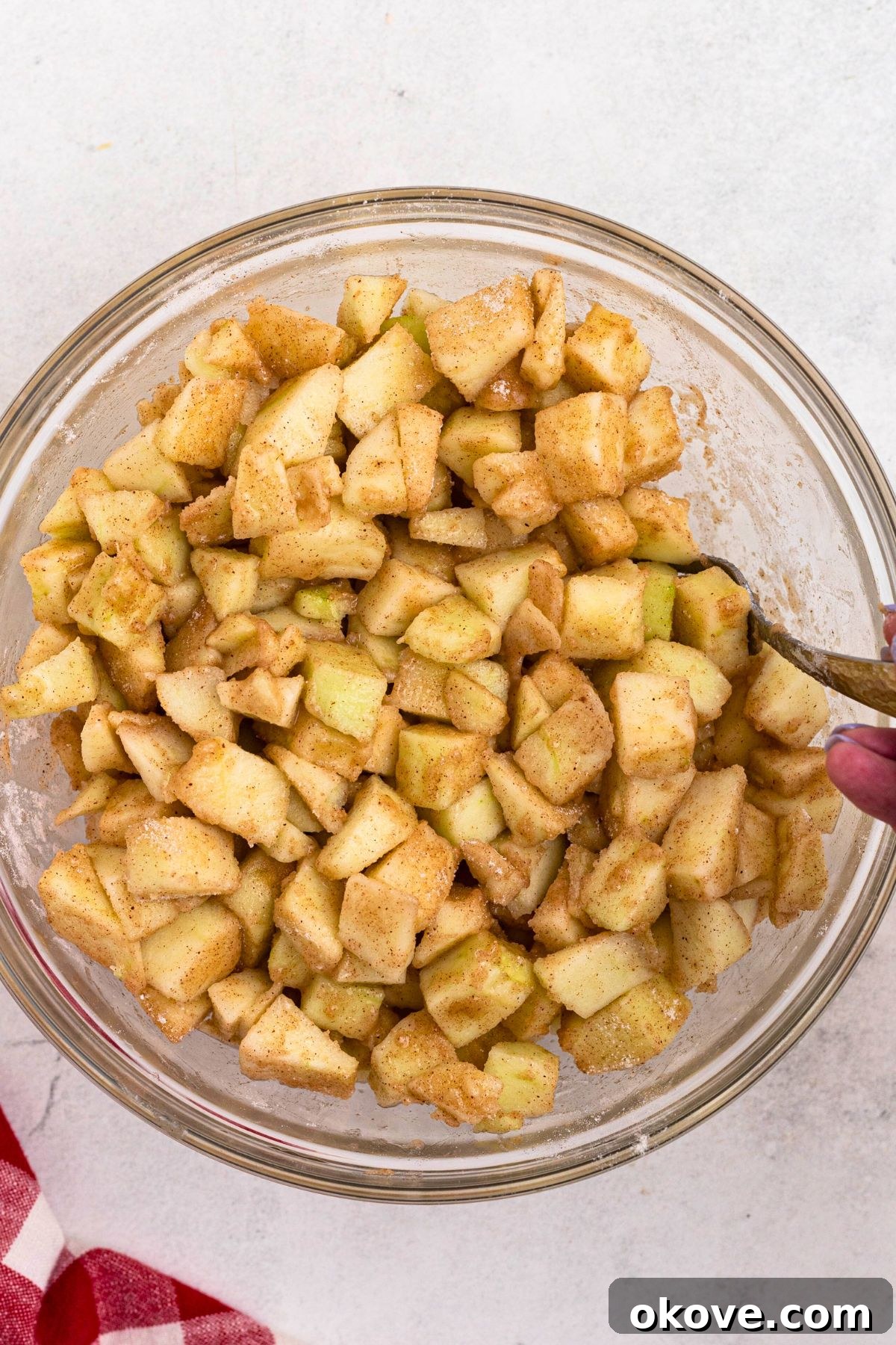 Sliced of apples tossed with flour, sugar, and spices. 