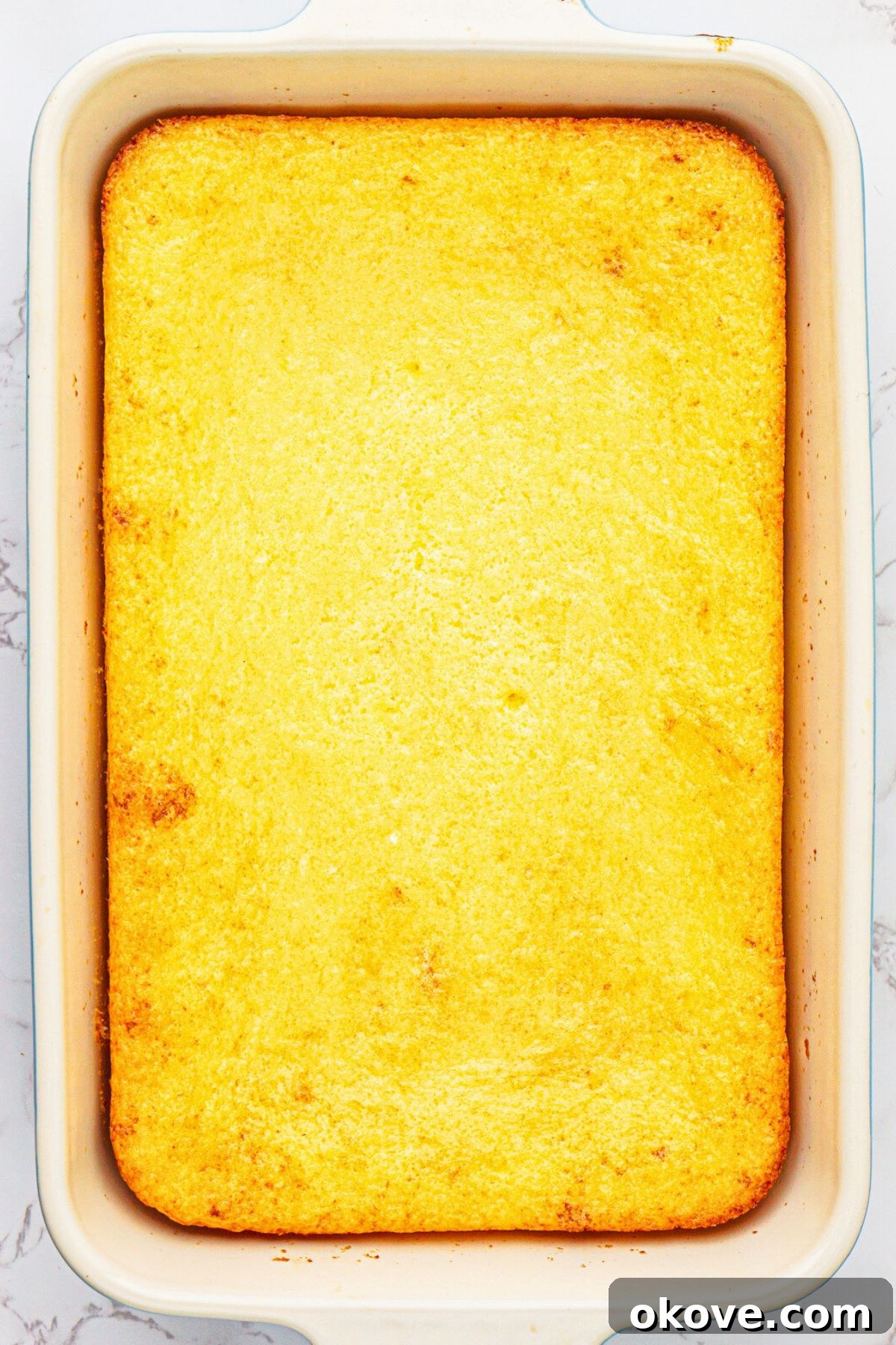 Effortless Two-Ingredient Lemon Bars 6 Lemon cake mix and pie filling in pie dish after they have been mixed and baked in a 9x13 baking dish. Golden brown and perfectly baked.