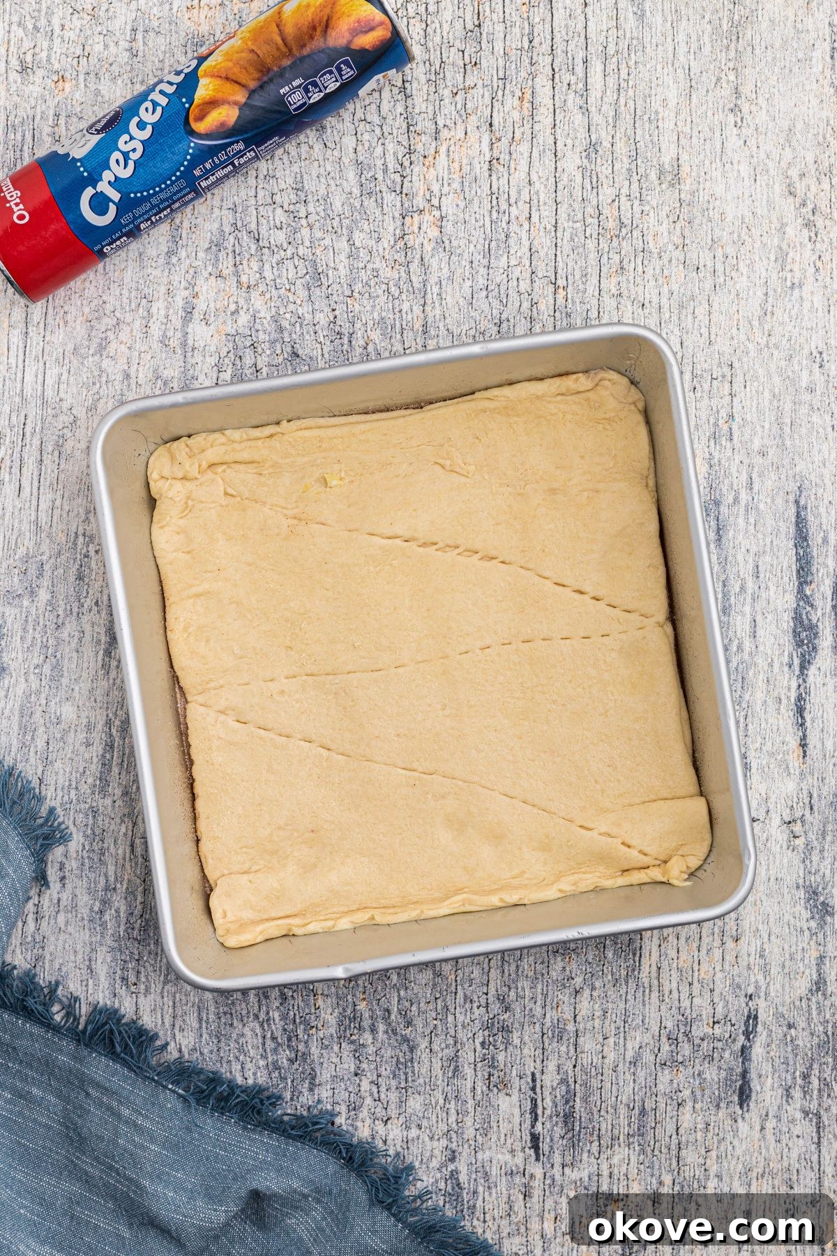 Cinnamon Sugar Crust Cheesecake 5 Crescent roll dough added to the bottom of the pan.