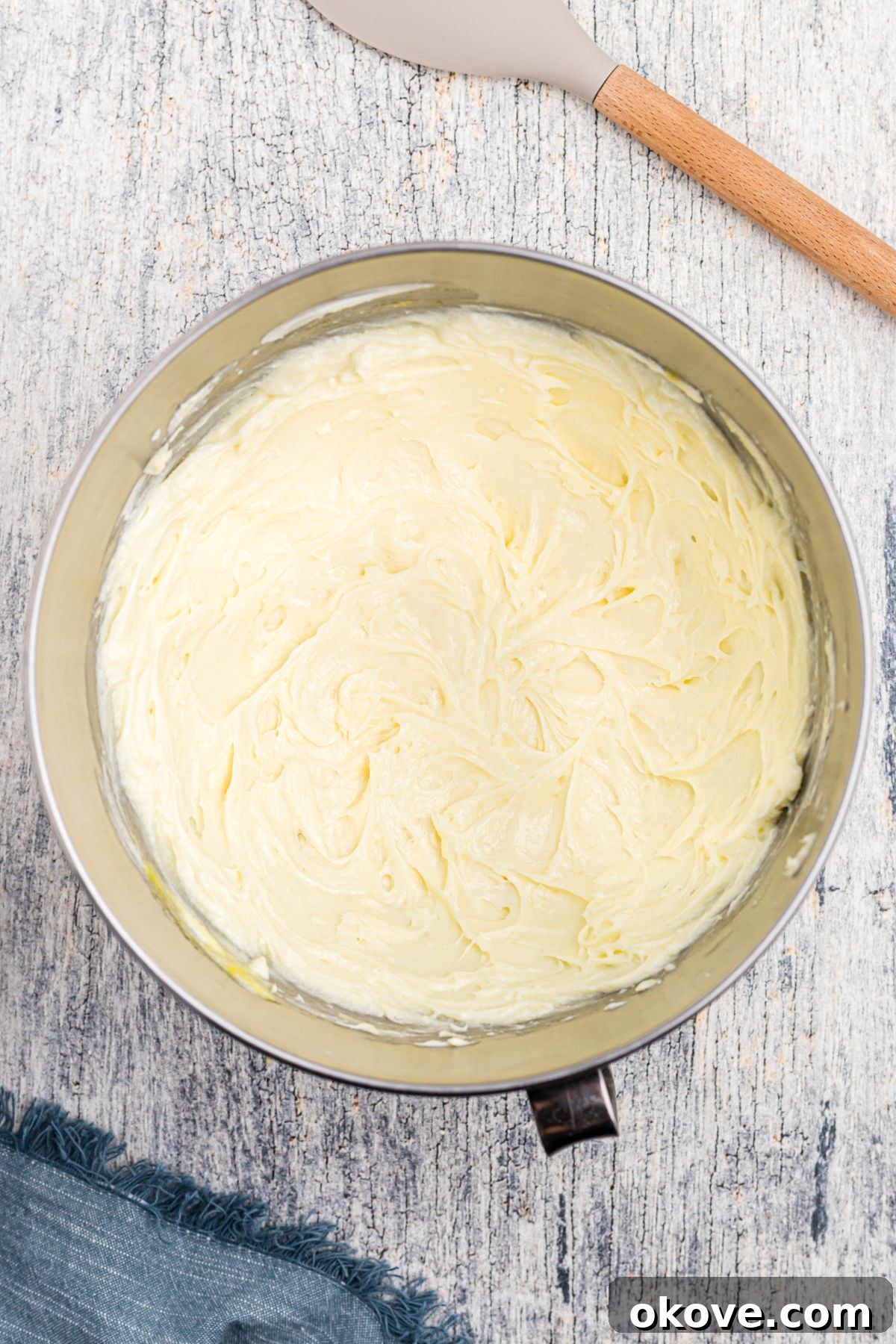 Cinnamon Sugar Crust Cheesecake 6 Cream cheese and sugar mixture in a large mixing bowl.