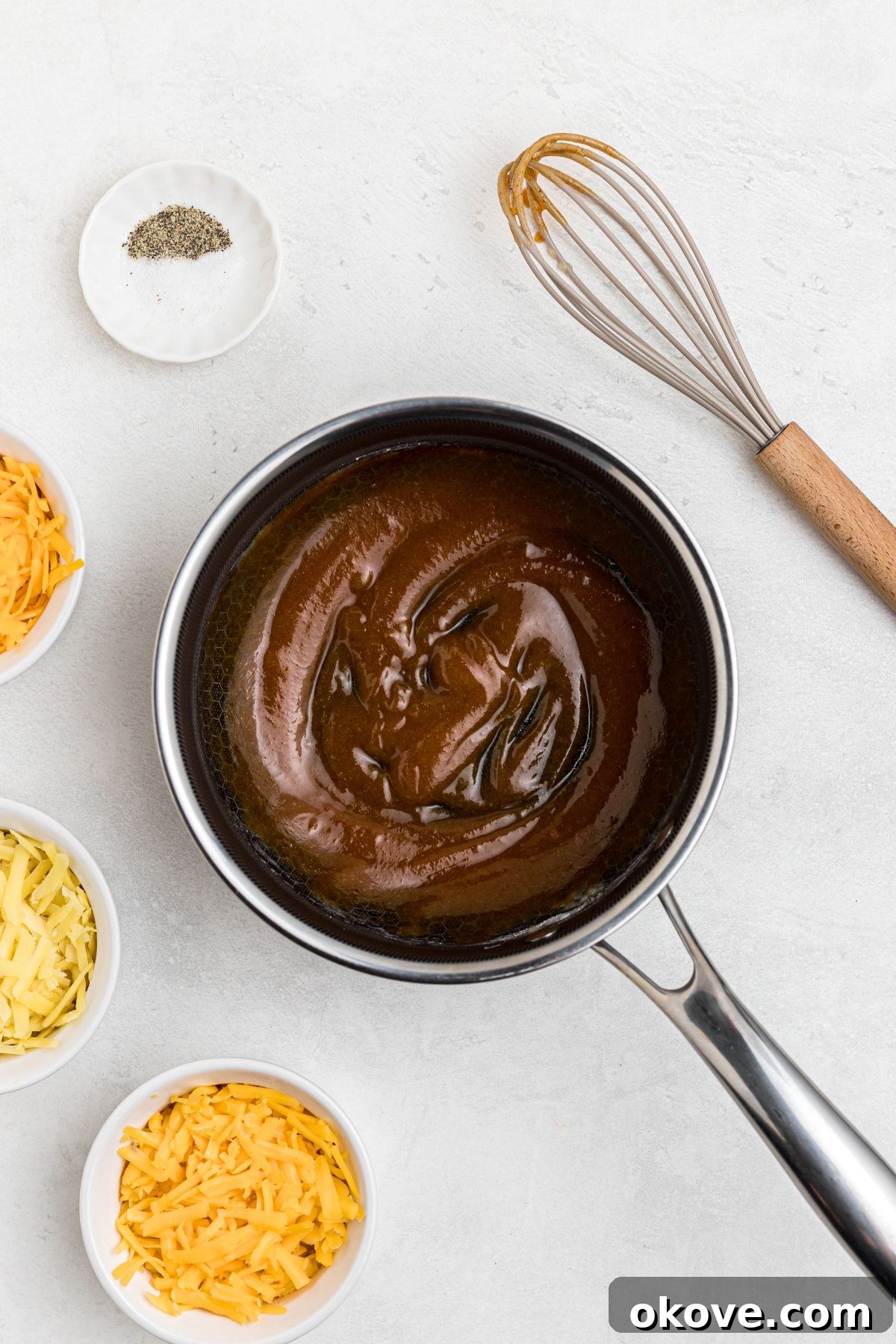Ultimate Smoked Macaroni and Cheese Bake 5 Seasonings mixed together with butter and flour, in a saucepan.