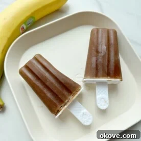 Guilt-Free Fudge Pops 9 Two healthy homemade fudgesicles on a plate, ready to be enjoyed.