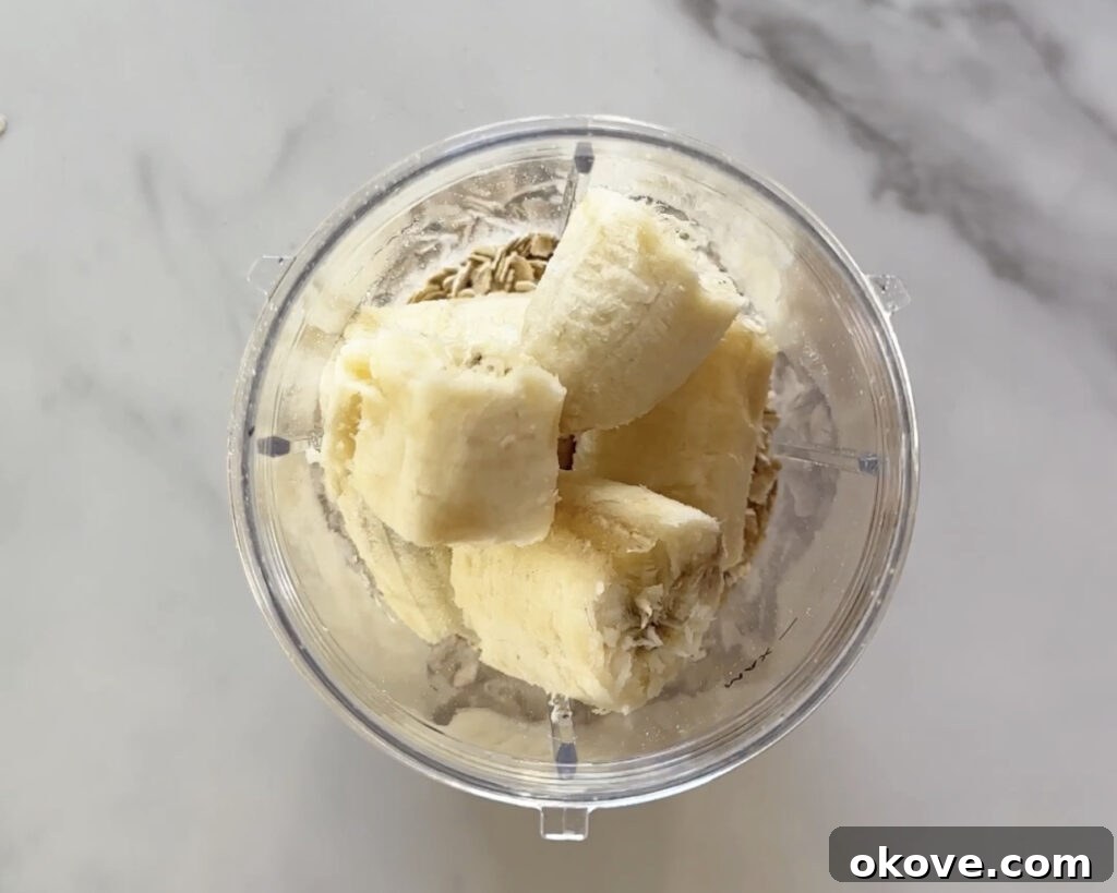 Close-up of blueberry waffle batter in a blender