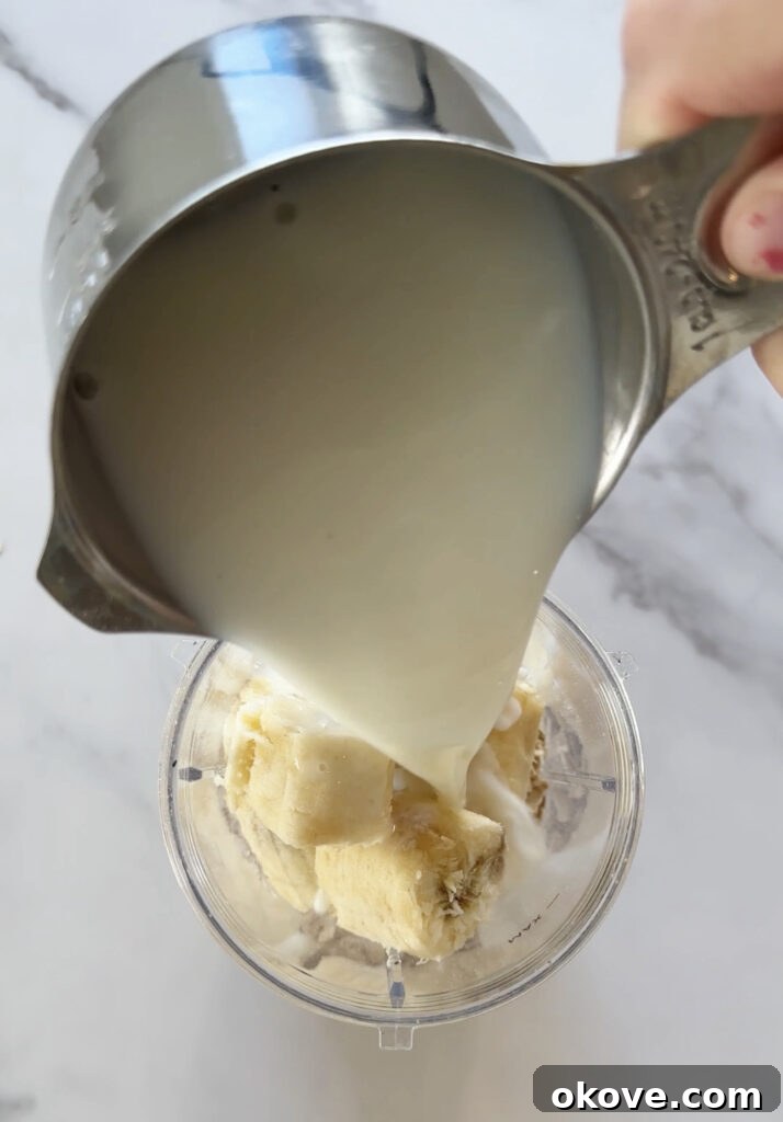 Pouring waffle batter into a mini waffle maker