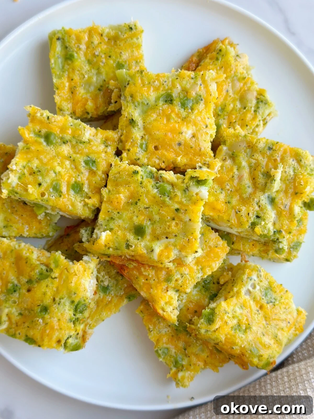 Garden Vegetable Frittata 2 Veggie frittata squares on a plate