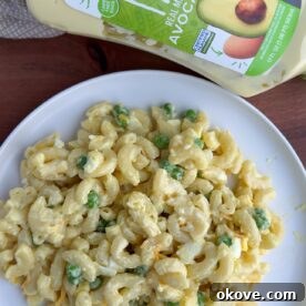 A small, circular image of macaroni salad on a plate.