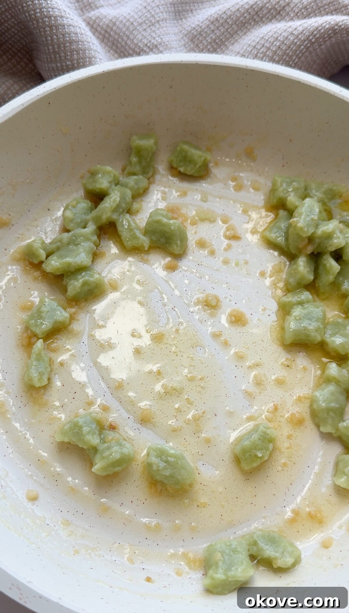 Emerald Avocado Pasta 5 Avocadough pasta served in a bowl, ready to eat.