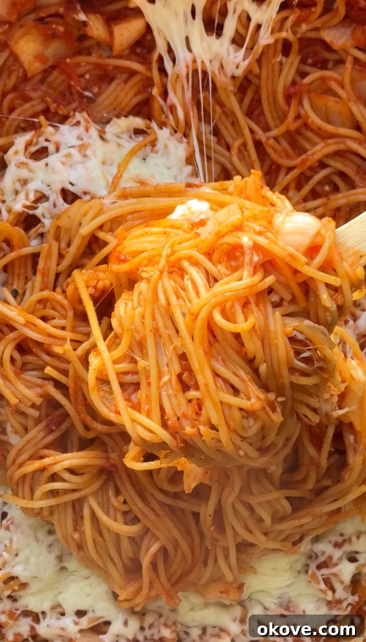 Hearty Baked Spaghetti Casserole 2 Easy oven-baked spaghetti up close, with tender noodles and melted cheese