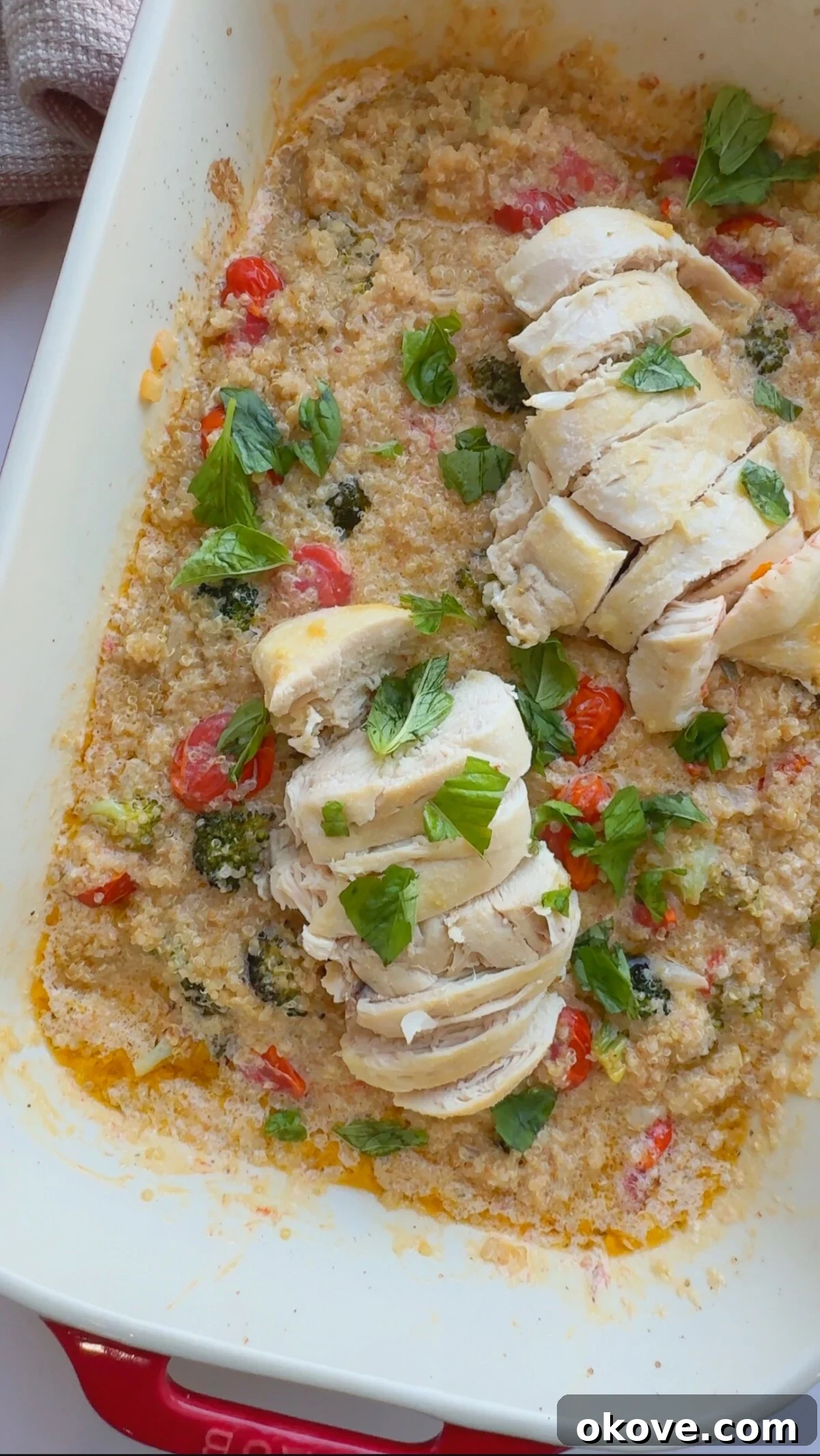 Nourishing Baked Chicken with Quinoa and Vegetables 2 Baked chicken, quinoa, and veggies in a baking pan