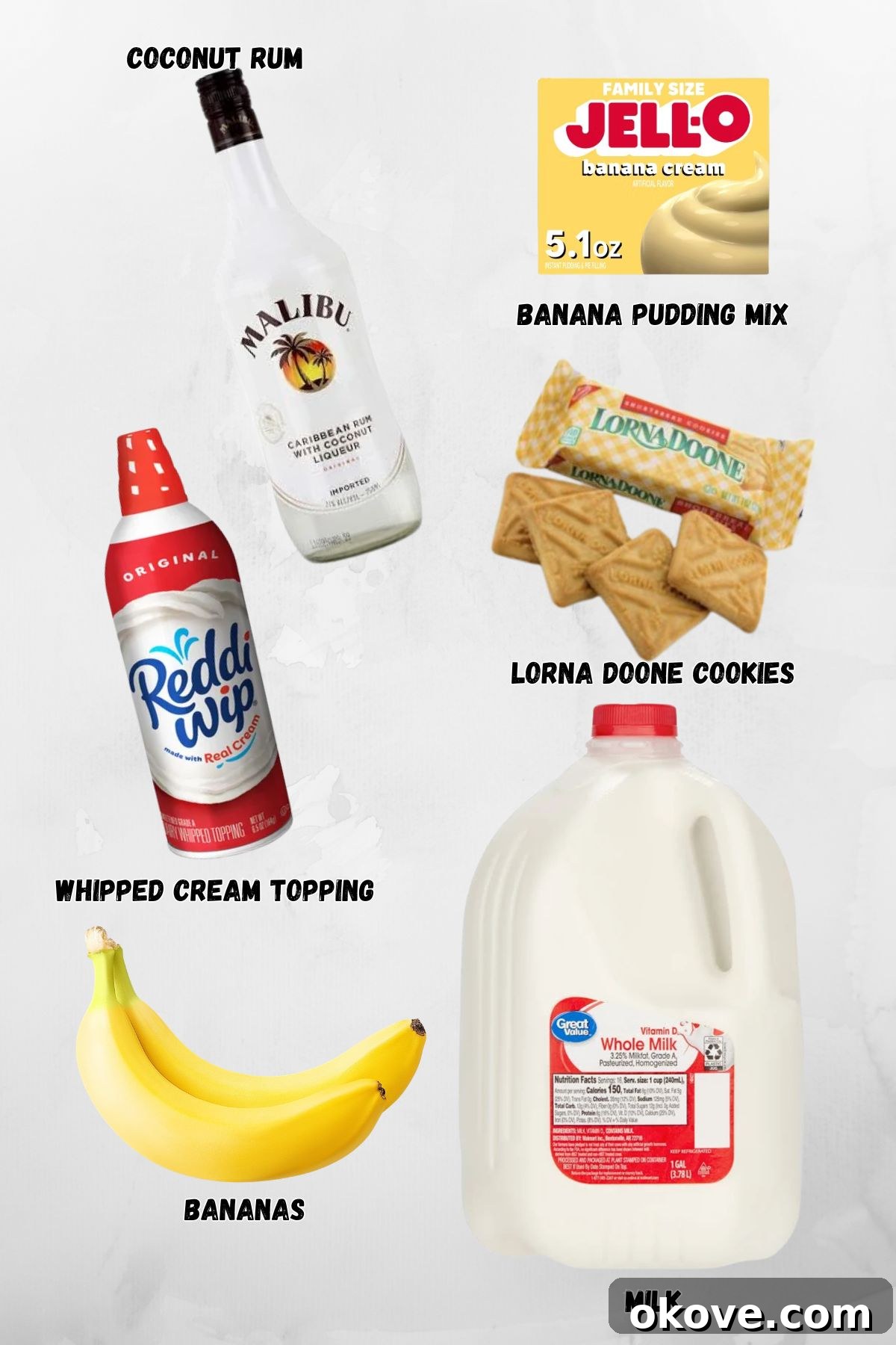 Sweet Banana Pudding Shooters 3 All the necessary ingredients for making banana pudding shots, including a box of banana pudding mix, milk, Malibu rum, Lorna Doone cookies, and fresh bananas, neatly arranged on a white marble countertop with labels.