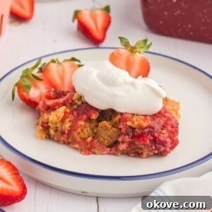 Fourth of July Recipes for a Memorable BBQ & Fireworks Night 51 Golden cake crumble on strawberry pie filling on a white plate.