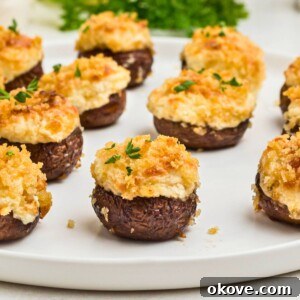 Stuffed mushrooms topped with breadcrumbs.