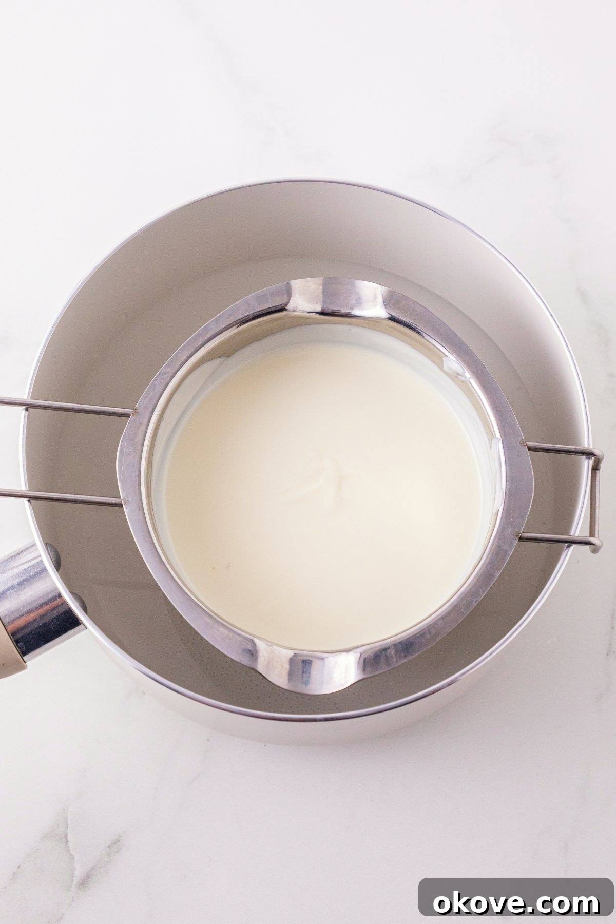 White chocolate melts, melted in a pan, and stirred until smooth and creamy. 